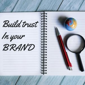 notebook written build trust in your brand